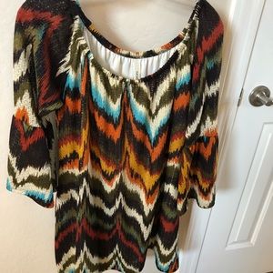 Blouse has pretty colors and ruffle sleeves